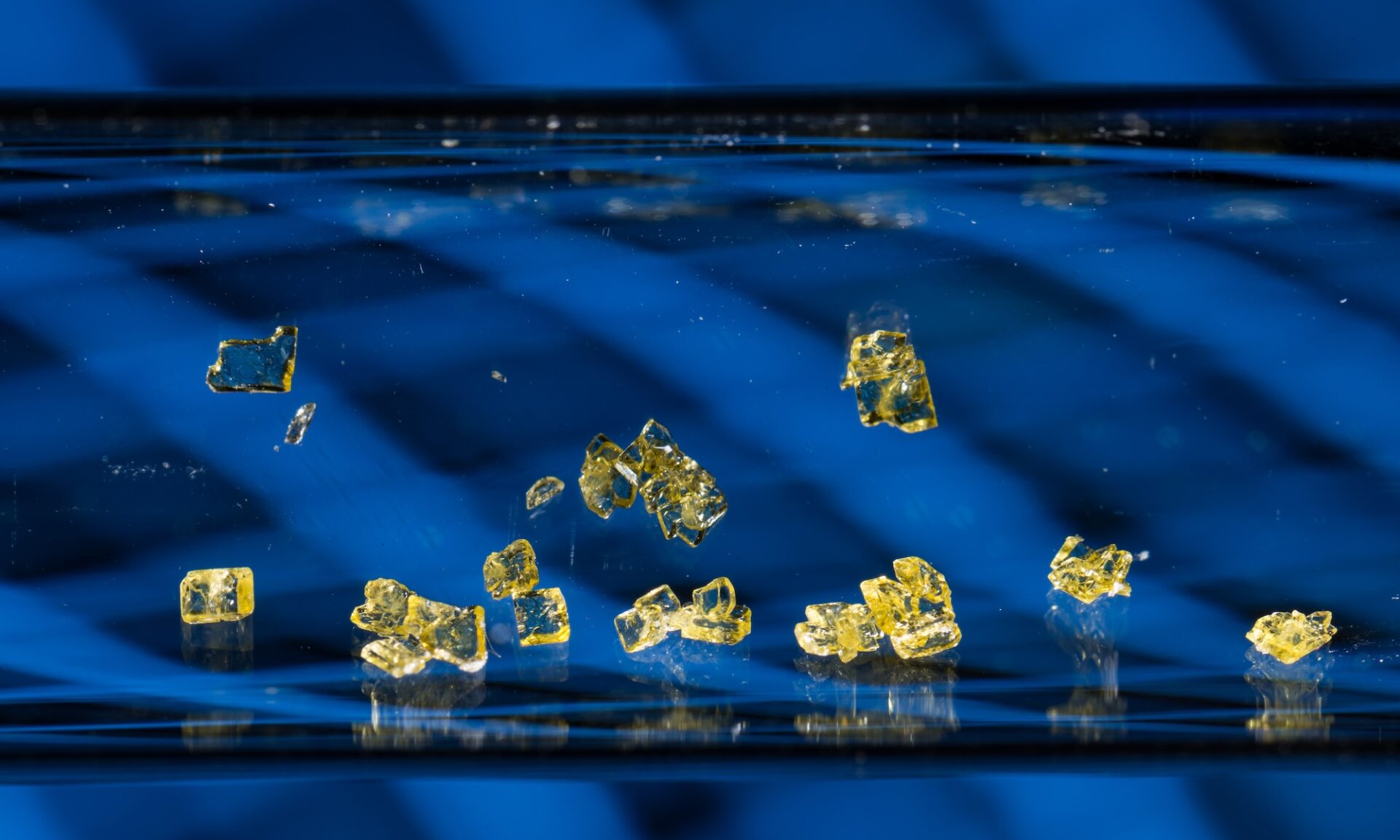 Indoline crystals obtained in Paladine’s model reaction are pictured inside a test tube. Indolines are structures appearing in many natural products and pharmaceuticals and have been used widely in the production of cancer-fighting drugs. @ University of Rochester / J. Adam Fenster