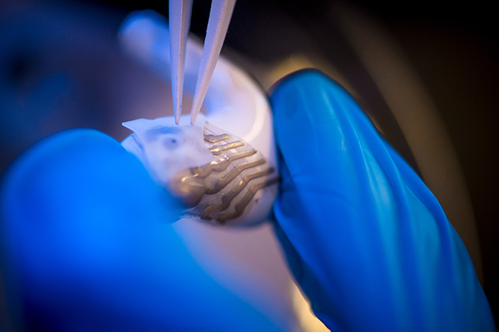 A close up of the sensors being installed on the earbud. @ University of California, San Diego