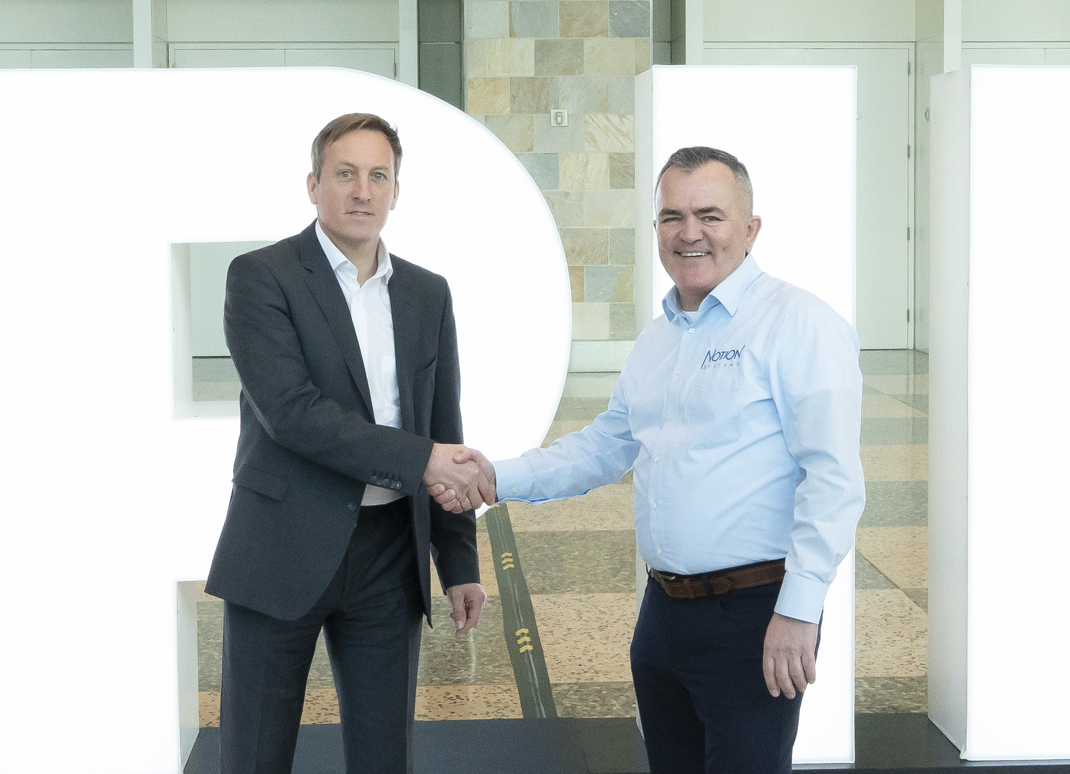 Dr. Thomas Glinsner, Corporate Technology Director for EV Group, and Antonio Schmidt, SVP Sales and Marketing for Notion Systems, at SPIE Photonics West 2023 in San Francisco. @ EVG