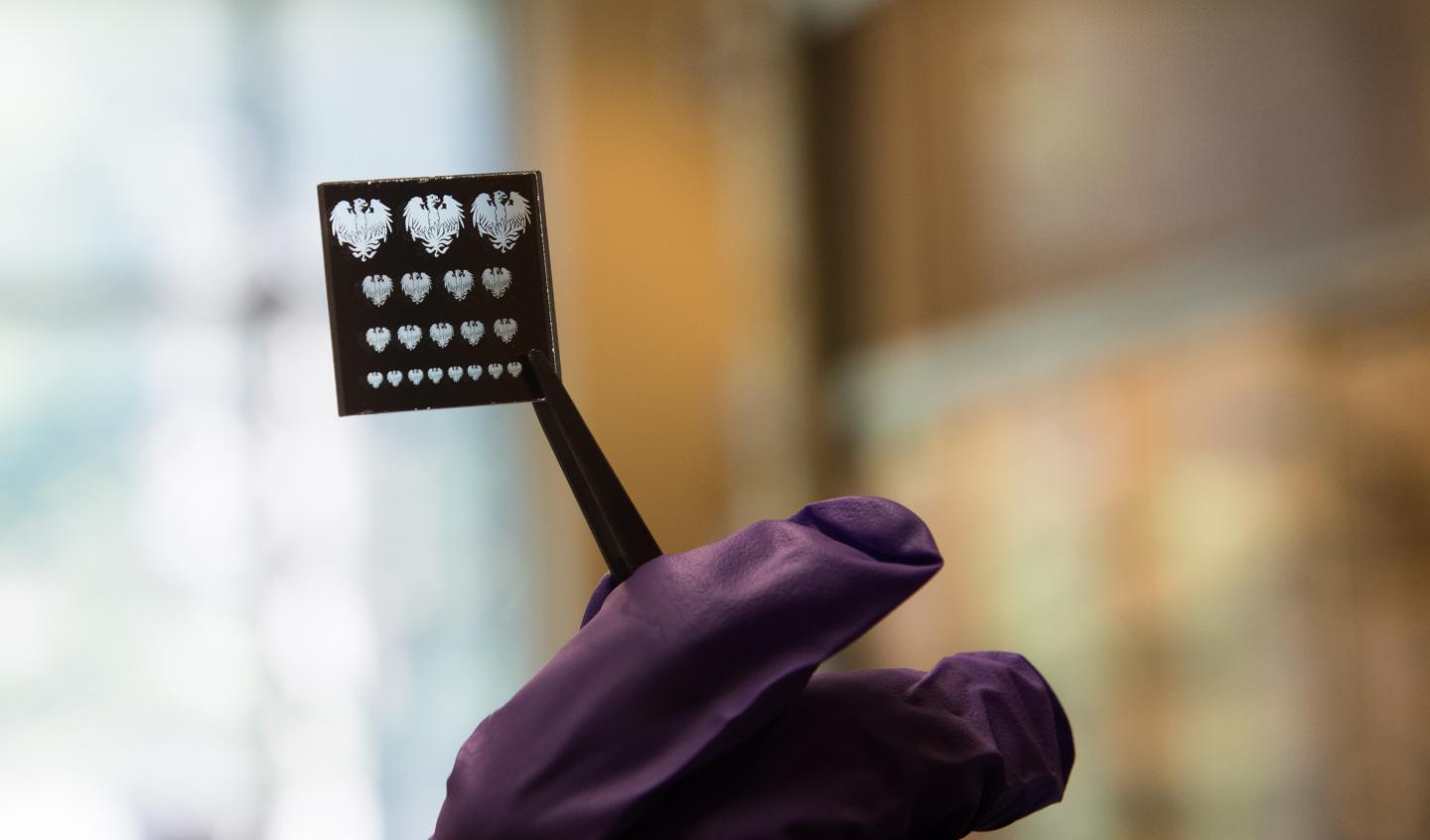 A 'mask' or stencil used to pattern nano materials with a new process that promises to make them far easier to make into LEDs, solar cells, transistors and other electronics. @ University of Chicago