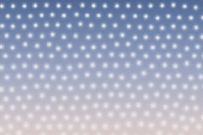 A gradient of defects in an electron crystal structure. The top of the image, in blue, represents cooler temperatures in which the spacing between electron clusters (white dots) is more uniform. The structure becomes less uniform moving down towards the hotter temperatures at the bottom of the image, shown in pink. Image credit: Jeremy Shen, Suk Hyun Sung and Robert Hovden, University of Michigan Engineering.