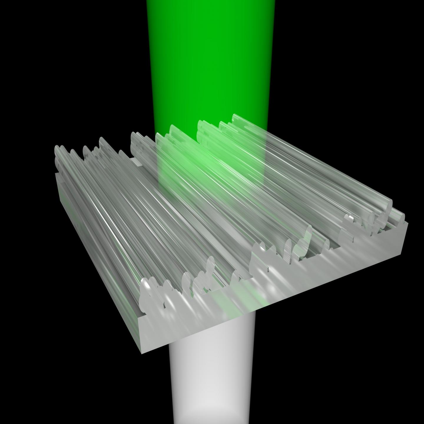 Light hits the 3-D printed nanostructures from below. After it is transmitted through, the viewer sees only green light -- the remaining colors are redirected. @ Thomas Auzinger